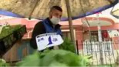 Koronavirüsü yendi, pazarda tezgahını kurdu