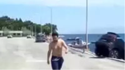 Kiraladığı lüks cipi denize atan şahıs, hiçbir şey olmamış gibi yürüdü Kiraladığı lüks cipi denize atan şahıs, hiçbir şey olmamış gibi yürüdü