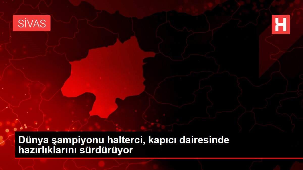 Dünya şampiyonu halterci, kapıcı dairesinde hazırlıklarını sürdürüyor