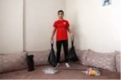 9 metrekarelik odada antrenman yapıyor