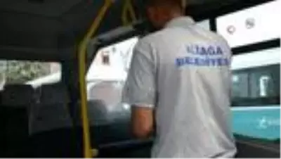 Aliağa'da sokak kısıtlamasında minibüsler dezenfekte edildi Aliağa'da sokak kısıtlamasında minibüsler dezenfekte edildi