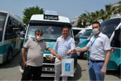 Aliağa'da sokak kısıtlamasında minibüsler dezenfekte edildi Aliağa'da sokak kısıtlamasında minibüsler dezenfekte edildi