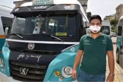 Aliağa'da sokak kısıtlamasında minibüsler dezenfekte edildi Aliağa'da sokak kısıtlamasında minibüsler dezenfekte edildi