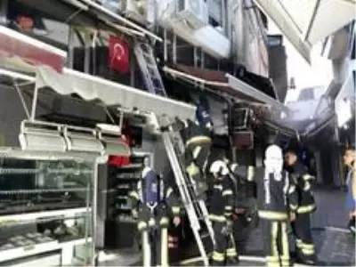 İş hanındaki dükkanda çıkan yangın diğer dükkanlara sıçramadan söndürüldü