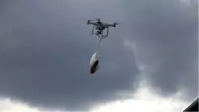 Ekmeğini bakkaldan drone ile aldı Ekmeğini bakkaldan drone ile aldı