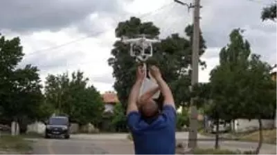 Ekmeğini bakkaldan drone ile aldı Ekmeğini bakkaldan drone ile aldı