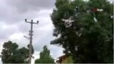Ekmeğini bakkaldan drone ile aldı Ekmeğini bakkaldan drone ile aldı