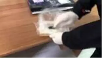 Kargodan gelen kitaptan uyuşturucu çıktıhayrete düştü Kargodan gelen kitaptan uyuşturucu çıktıhayrete düştü