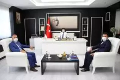 Ocak Başkanı Karaoğlan Rektörü Karacoşkun'la bir araya geldi Ocak Başkanı Karaoğlan Rektörü Karacoşkun'la bir araya geldi