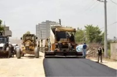 Büyükşehir Belediyesinin Tarsus'ta asfalt çalışmaları sürüyor Büyükşehir Belediyesinin Tarsus'ta asfalt çalışmaları sürüyor