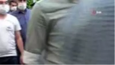 Şehit eşinin fotoğrafını bir an olsun elinden bırakmadı Şehit eşinin fotoğrafını bir an olsun elinden bırakmadı