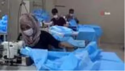 Sınırdaki atölyeler koronayı fırsata çevirdi...Koronavirüs tekstil atölyelerine iş imkanı açtı Sınırdaki atölyeler koronayı fırsata çevirdi...Koronavirüs tekstil atölyelerine iş imkanı açtı