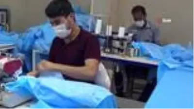 Sınırdaki atölyeler koronayı fırsata çevirdi...Koronavirüs tekstil atölyelerine iş imkanı açtı Sınırdaki atölyeler koronayı fırsata çevirdi...Koronavirüs tekstil atölyelerine iş imkanı açtı