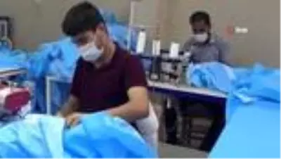 Sınırdaki atölyeler koronayı fırsata çevirdi...Koronavirüs tekstil atölyelerine iş imkanı açtı Sınırdaki atölyeler koronayı fırsata çevirdi...Koronavirüs tekstil atölyelerine iş imkanı açtı
