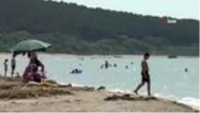 Kocaeli'de vatandaşlar denizin keyfini çıkarmaya başladı
