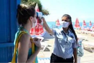 Antalya'nın mavi bayraklı falez plajları pandemi kurallarıyla açıldı Antalya'nın mavi bayraklı falez plajları pandemi kurallarıyla açıldı