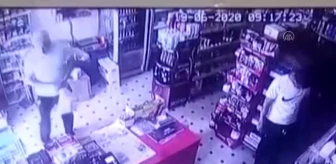 Market kasasından hırsızlık anı güvenlik kamerasına yansıdı