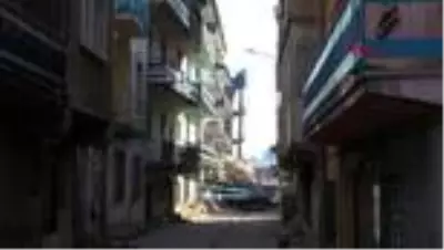 ERZURUM Çöken binada inceleme yapıldı ERZURUM Çöken binada inceleme yapıldı