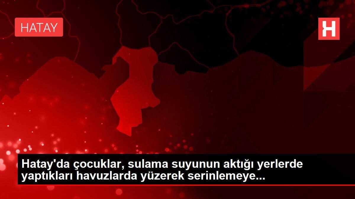 Hatay'da çocuklar, sulama suyunun aktığı yerlerde yaptıkları havuzlarda yüzerek serinlemeye...