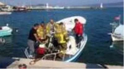 Maden Adası'nda çıkan yangını, balıkçı teknesiyle bölgeye giden itfaiyeciler söndürdü Maden Adası'nda çıkan yangını, balıkçı teknesiyle bölgeye giden itfaiyeciler söndürdü