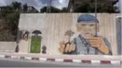 Suriye sınırındaki ilçenin sokakları Yakup öğretmenin çizimleriyle renklendi Suriye sınırındaki ilçenin sokakları Yakup öğretmenin çizimleriyle renklendi