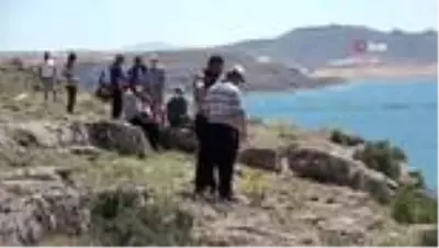 Serinlemek için baraj gölüne giren iki gençten biri boğuldu Serinlemek için baraj gölüne giren iki gençten biri boğuldu