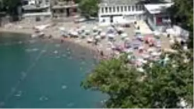 Sıcak havada plaja akın ettiler Sıcak havada plaja akın ettiler