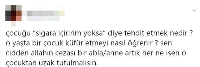 Kucağındaki çocuğa sigara içiren kadının görüntüleri tepki çekti Kucağındaki çocuğa sigara içiren kadının görüntüleri tepki çekti