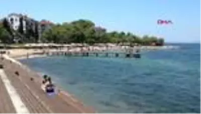 Mavi bayraklı Altın Kemer plajı tatilcilerin gözdesi haline geldi Mavi bayraklı Altın Kemer plajı tatilcilerin gözdesi haline geldi