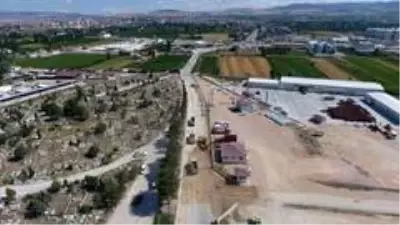 Mezarlık yolu asfaltlanıyor Mezarlık yolu asfaltlanıyor