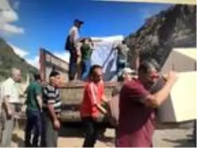 Yusufeli'nde yanan 35 evin sahiplerine yardım eli Yusufeli'nde yanan 35 evin sahiplerine yardım eli