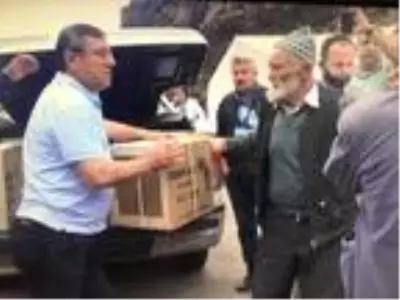 Yusufeli'nde yanan 35 evin sahiplerine yardım eli Yusufeli'nde yanan 35 evin sahiplerine yardım eli