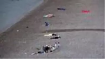 ANTALYA Konyaaltı Sahili'nde sabahlıyorlar ANTALYA Konyaaltı Sahili'nde sabahlıyorlar