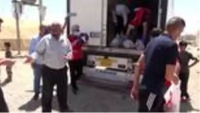 Türk Kızılay 550 göçmen aileye kurban eti dağıttı Türk Kızılay 550 göçmen aileye kurban eti dağıttı