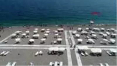 ANTALYA Sahilde koronavirüs unutuldu ANTALYA Sahilde koronavirüs unutuldu