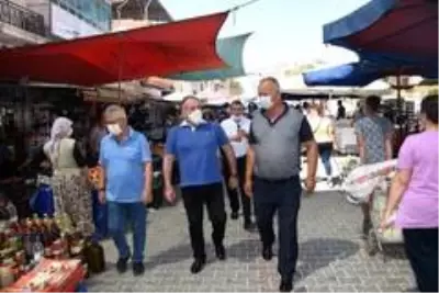 Başka Öndeş, semt pazarında vatandaşlara korona virüs uyarısında bulundu Başka Öndeş, semt pazarında vatandaşlara korona virüs uyarısında bulundu