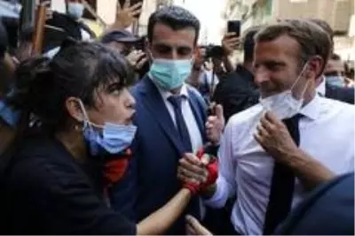 Lübnanlı kadından Fransa Cumhurbaşkanı Macron'a: 'Parayı yolsuz hükümetimize vermeyin' Lübnanlı kadından Fransa Cumhurbaşkanı Macron'a: 'Parayı yolsuz hükümetimize vermeyin'