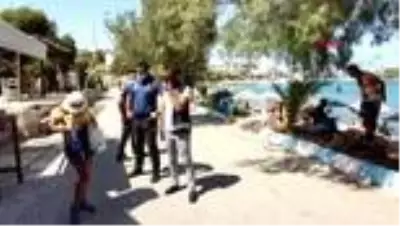 MUĞLA Maskeler çantadan, cepten çıktı MUĞLA Maskeler çantadan, cepten çıktı