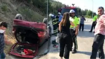 Takla atan otomobilin sürücüsü yaralandı Takla atan otomobilin sürücüsü yaralandı