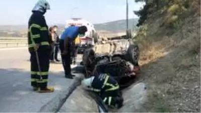 Takla atan otomobilin sürücüsü yaralandı Takla atan otomobilin sürücüsü yaralandı