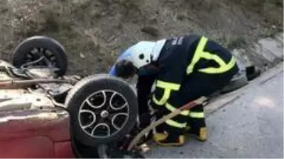 Takla atan otomobilin sürücüsü yaralandı Takla atan otomobilin sürücüsü yaralandı