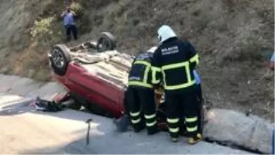 Takla atan otomobilin sürücüsü yaralandı Takla atan otomobilin sürücüsü yaralandı