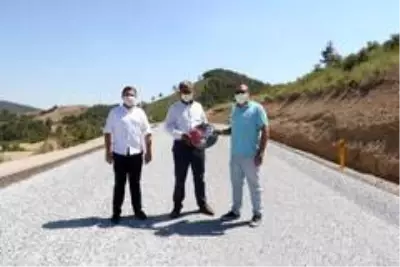 Muhtarlar yol çalışmasından memnun Muhtarlar yol çalışmasından memnun