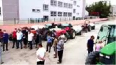 ADANA Kozan'da köylüler traktörlerle ilçeyi dezenfekte etti ADANA Kozan'da köylüler traktörlerle ilçeyi dezenfekte etti