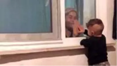 Minik Ali'nin karantinadaki babaannesiyle cam arkasından oyun oynadığı anlar yürekleri dağladı Minik Ali'nin karantinadaki babaannesiyle cam arkasından oyun oynadığı anlar yürekleri dağladı