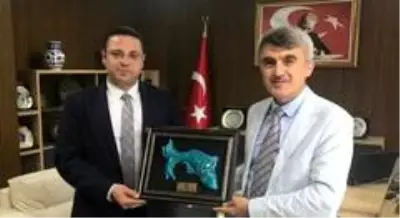 Rektör Uysal'dan İdare Mahkemesi Başkanı Cengiz'e ziyaret Rektör Uysal'dan İdare Mahkemesi Başkanı Cengiz'e ziyaret
