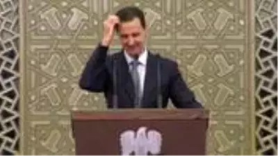 Konuşma yaparken fenalaşan Beşar Esed kürsüden inmek zorunda kaldı Konuşma yaparken fenalaşan Beşar Esed kürsüden inmek zorunda kaldı