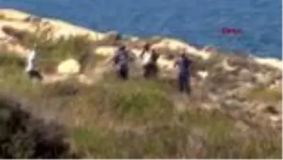 Ayvalık'ta deniz kenarında erkek cesedi bulundu Ayvalık'ta deniz kenarında erkek cesedi bulundu