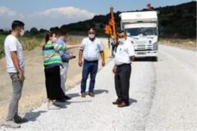 Gölmarmara'daki yol yapım çalışması tam not aldı Gölmarmara'daki yol yapım çalışması tam not aldı