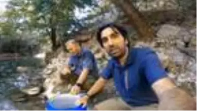 Kuruyan deredeki yavru balıkları kurtardılar Kuruyan deredeki yavru balıkları kurtardılar